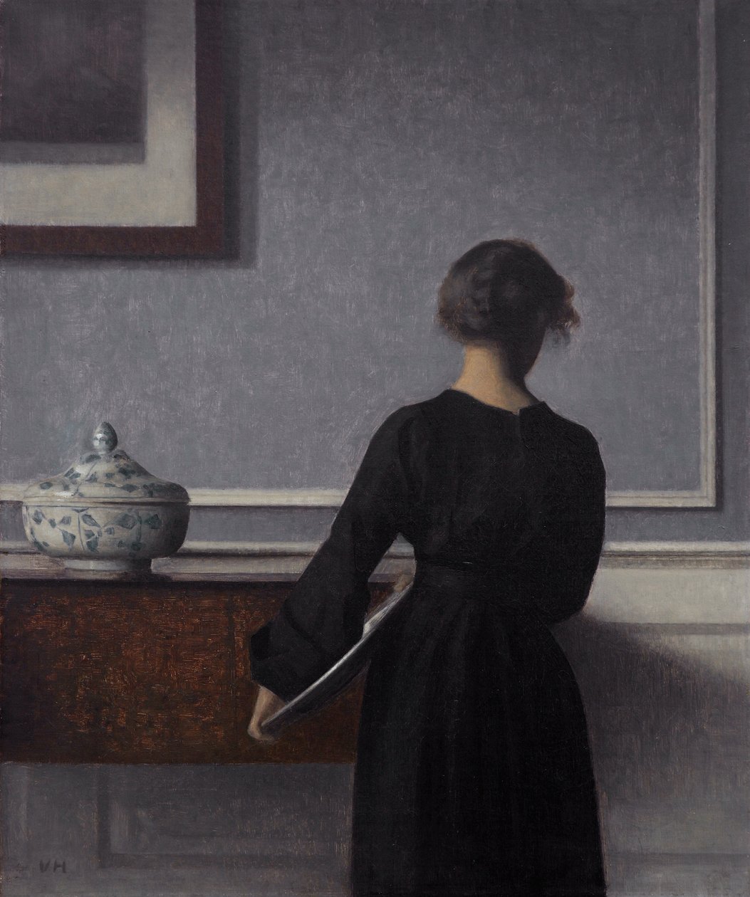 Interior com jovem por trás de Vilhelm Hammershøi
