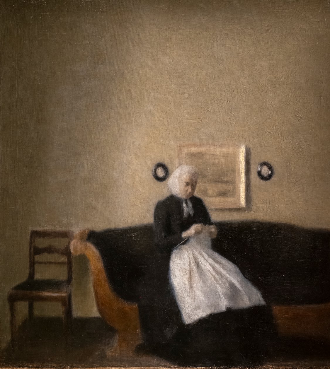 Interior com a mãe do artista de Vilhelm Hammershoi