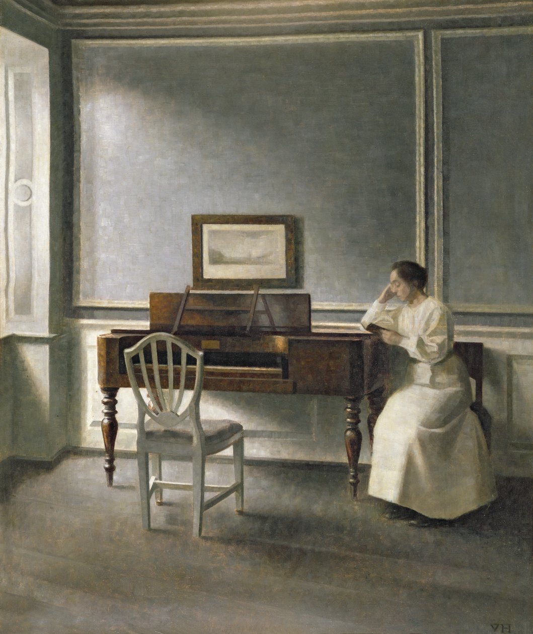 Mulher lendo por um piano, 1907 de Vilhelm Hammershoi