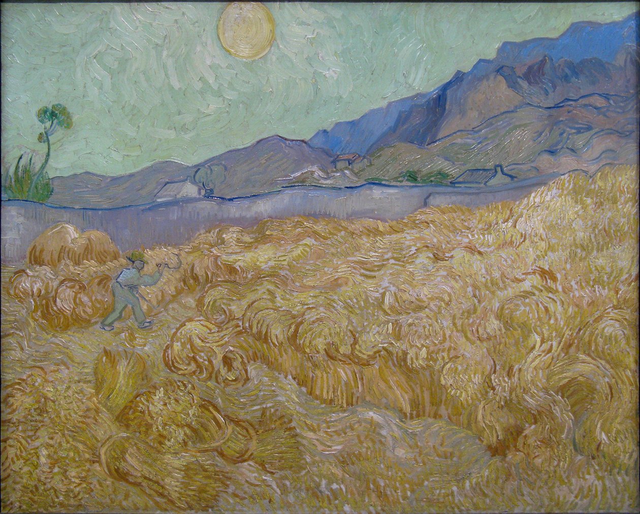 Milharal com cortador de Vincent van Gogh