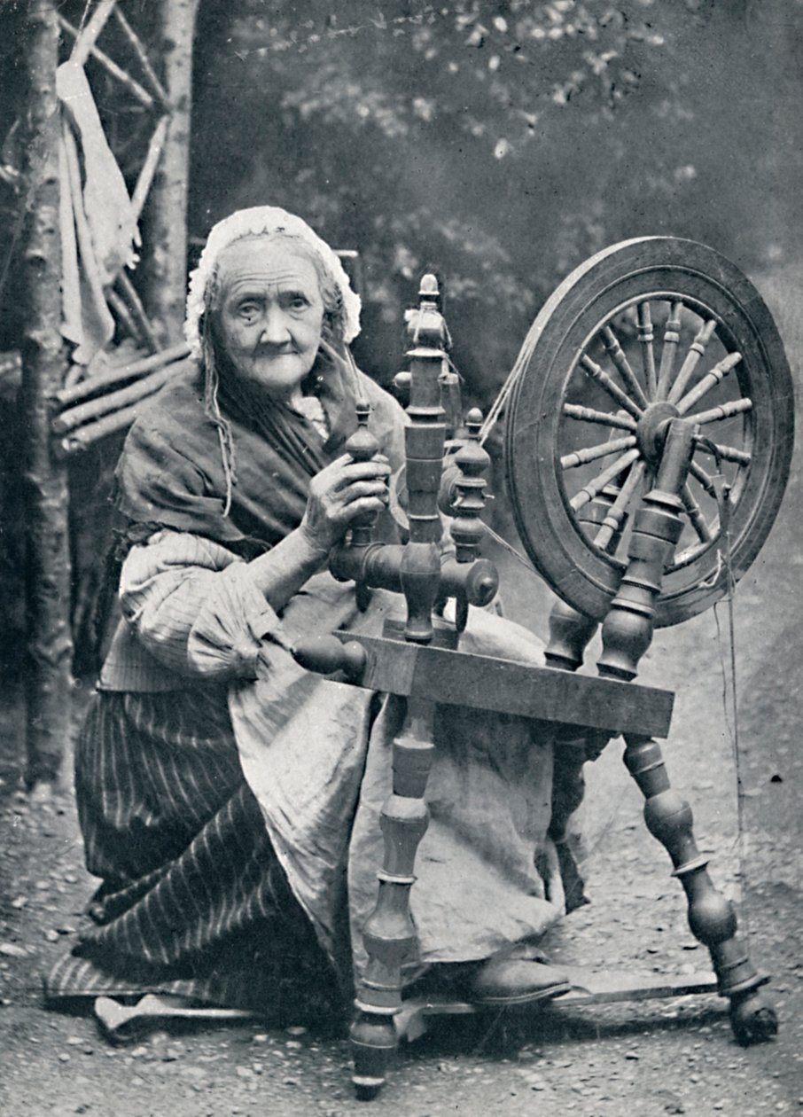 Uma velha irlandesa em sua roda giratória, 1912 de W. Lawrence