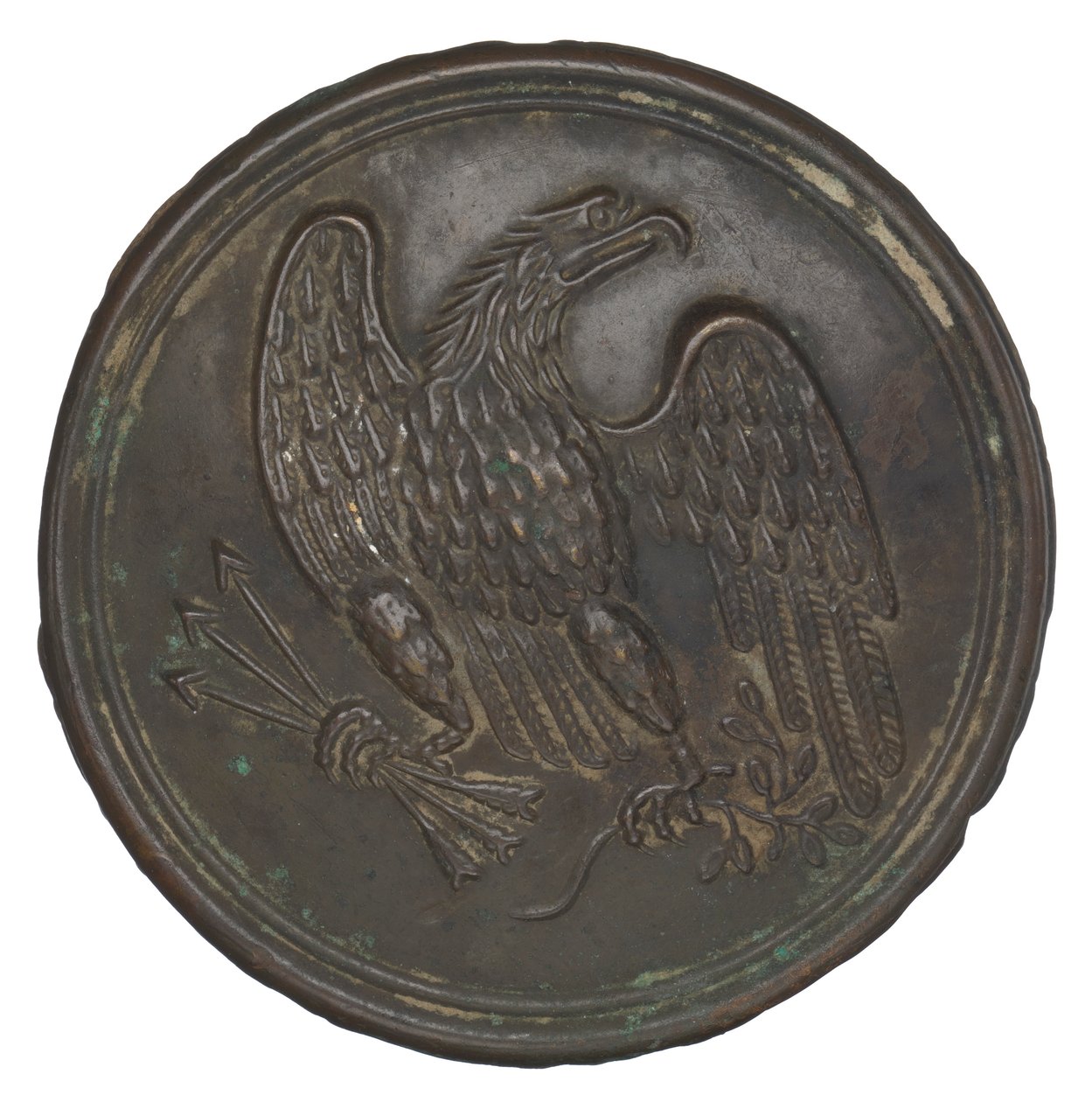 Placa com um desenho de águia de latão estampado a partir de uma correia de caixa de cartucho, 1862-1865. de Warren H. Wilkinson