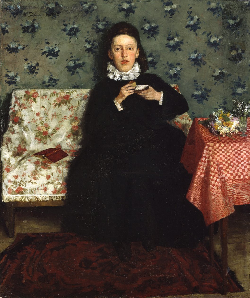 No canapé de Wilhelm Trübner