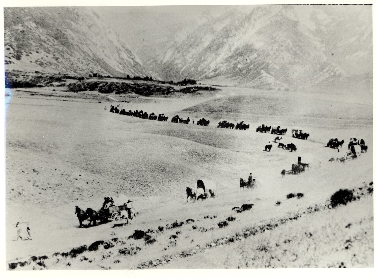 Pioneiros coletando imigrantes da estação de trem e levando-os para o Mormon Salt Lake City de William Henry Jackson