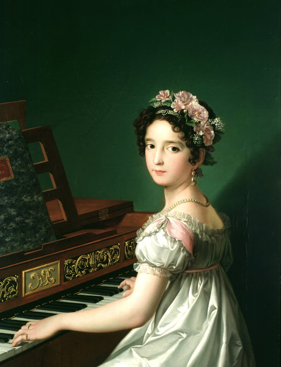 Manuela González Velázquez, tocando piano de Zacarias Gonzalez Velazquez