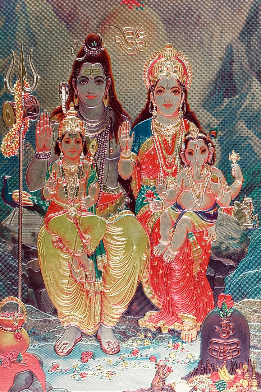 Deus Shiva e Deusa Parvati com seu filho Ganesha. de . .