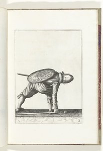 O exercício de escudo e espiga: o soldado se abaixa para pegar o espinho (nº 28), 1618 O Nassausche Wapen-Handelinge, van Schilt, Spies, Rappier and the Targe: beyde figuerlick retratado, e o emoldurado após a nova ordem [de] (...) Maurits van Nassau (t de Adam van Breen