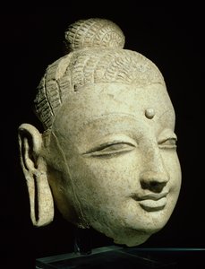 Cabeça de um Buda sorridente, estilo greco-budista, do Afeganistão, do século I-IV (estuque)