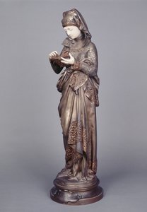 O Leitor (escultura em marfim e bronze)