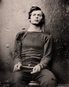 Lewis Powell em ferros de pulso a bordo do USS Saugus, 1865