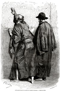 Judeus orando em frente ao Muro de Salomão em Jerusalém