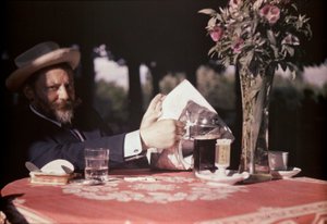 Frank Eugene sentado à mesa de Alfred Stieglitz