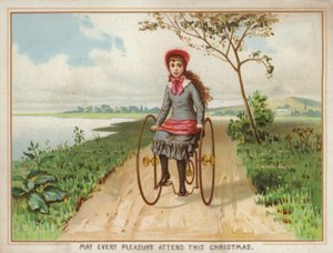 Menina andando de triciclo no país de American School