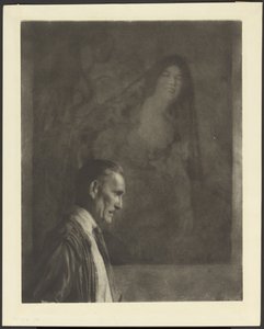 [Homem com bigode pequeno e elegante de perfil, posado em frente a uma pintura de uma mulher vestida com trajes espanhóis].