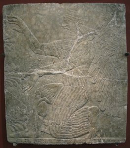 Divindade alada pela árvore sagrada. Alívio do palácio de Ashurnasirpal II em Kalhu, Nimrud, século IX aC de Assyrian