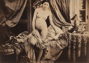 [Nu em pé ao lado da cama], c. 1854. de Auguste Belloc