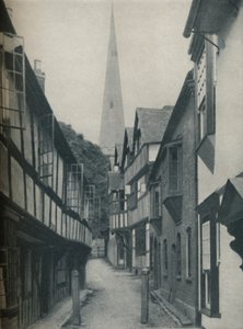 Casas justas reunidas em volta de uma torre que aponta para o céu, c1935 de BC Clayton