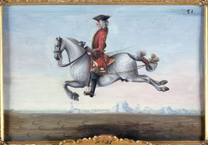 No. 51 Um cavalo cinzento malhado da Escola de Equitação Espanhola que executa um movimento de adestramento chamado um Capriole (wc em papel)