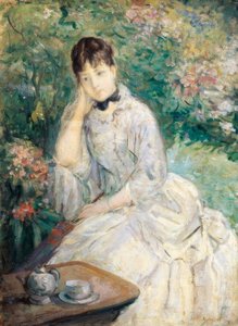 Jovem mulher sentada num sofá, de Berthe Morisot