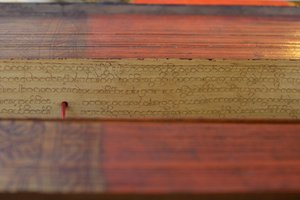 Manuscrito de Folha de Palma Burmesa (madeira e pergaminho) de Burmese School