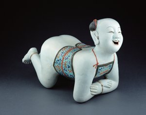 Um travesseiro de porcelana chinesa na forma de um menino seminu (porcelana)