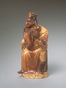 Uma figura de Guandi sentado, do século 14 ao 15 (esculpida em marfim) de Chinese School