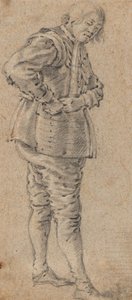 Um homem de pé a vestir uma armadura de Cornelis Saftleven