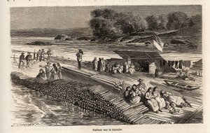 Uma jangada de madeira no Danúbio, para o transporte de mercadorias e pessoas, desenhada por Lancelot, para ilustrar a viagem de Victor Duruy de Paris a Bucareste em 1860. Gravura em "Le tour du monde", editado por Edouard Charton