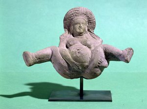 Estatueta de uma mulher dando à luz, dada a mulheres grávidas para um parto bem sucedido, de Alexandria (terracota)