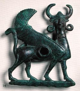 Cavalo mordido na forma de um touro de asas de cabeça humana, de Luristão, Irão (bronze)