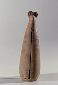 Instrumento de sopro na forma de uma mulher vestida, de Lorestan, Irã, início do primeiro milênio aC (cerâmica)