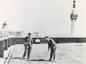Golfistas da cidade visto do monumento de English Photographer