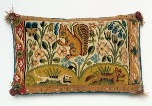 Um painel de tapeçaria de almofada de alfinetes com um esquilo e o lema, &39;boa vontade é tudo&39; de English School