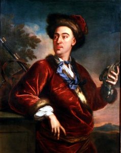 Retrato de um cavalheiro segurando um pássaro morto de English School