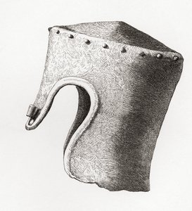 Capacete Cilíndrico de ponta plana do século XIII com Nasal, escavado no Castelo de Montgomery em 1841, do Exército Britânico: As suas Origens, Progresso e Equipamento, publicado em 1868. de English School