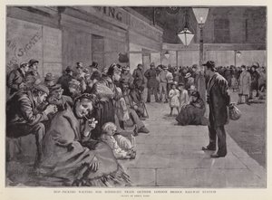 Colhedores de lúpulo à espera do comboio da meia-noite para Kent (litho) de Enoch Ward