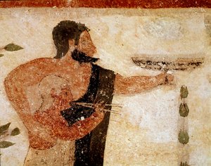 Um homem barbudo apresentando uma taça, perto dele um músico (Detalhe do fresco, 530 aC) de Etruscan