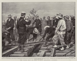 O homem prático no trabalho na China, reparando uma ferrovia