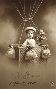1913 cartão de Ano Novo, com menino subindo um balão, com muito dinheiro como lastro de French Photographer