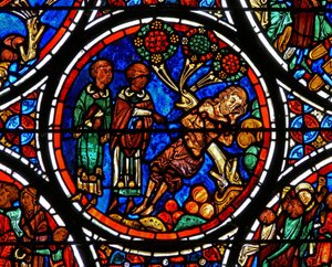 Detalhe de uma janela representando a parábola do Bom Samaritano: o sacerdote e Levi passam por de French School