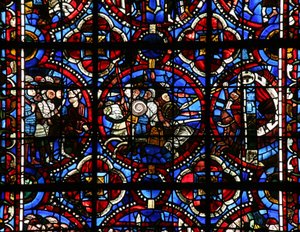 Janela w17-L representando Adonibezek com um grupo de soldados e uma pessoa com as mãos atadas; Uma cena de batalha fora de uma cidade que está em chamas de French School