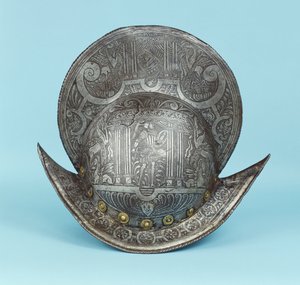 Um pente morion, gravado com cabeças de querubim, esfinges e cavalos alados, o centro com um guerreiro pseudo clássico em armadura contemporânea com espada e escudo de German School