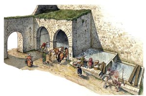 Idade Média: reconstituição de uma fonte de água de nascente no centro de Itália no século XV. É utilizada como lavadouro, bebedouro e ponto de água para os habitantes da cidade.