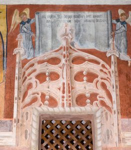 A inscrição dedicatória de Botoneri "Esta capela de San Magno foi feita com as devidas esmolas doadas de Giovanni di Cherasco Botoneri