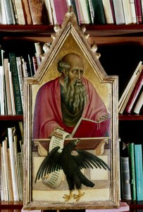 São João Evangelista mostrado com seu símbolo, uma águia, século XV