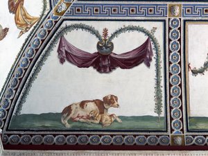 A câmera com Fregio di Amorini Câmara do detalhe de friso de Cupido de um cão e um filhote de cachorro, afresco de 1520 de Giulio Romano