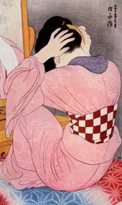 Uma mulher japonesa vestindo seus cabelos, 1920s 1930.