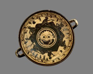 Taça ática de figuras negras decorada com um tondo de cabeça de górgona rodeado por seis homens reclinados assistindo a um simpósio, à maneira do Andocides Painter, c.500 aC (cerâmica) de Greek