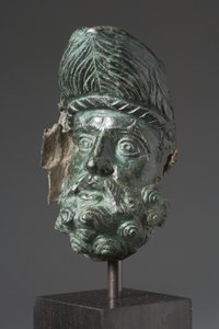 Bico de embarcação em forma de cabeça de Herakles (bronze) de Greek