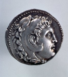 Alexandre, o Grande Tetradrachm, mostrando a cabeça de Herakles usando um cocar de pele de leão